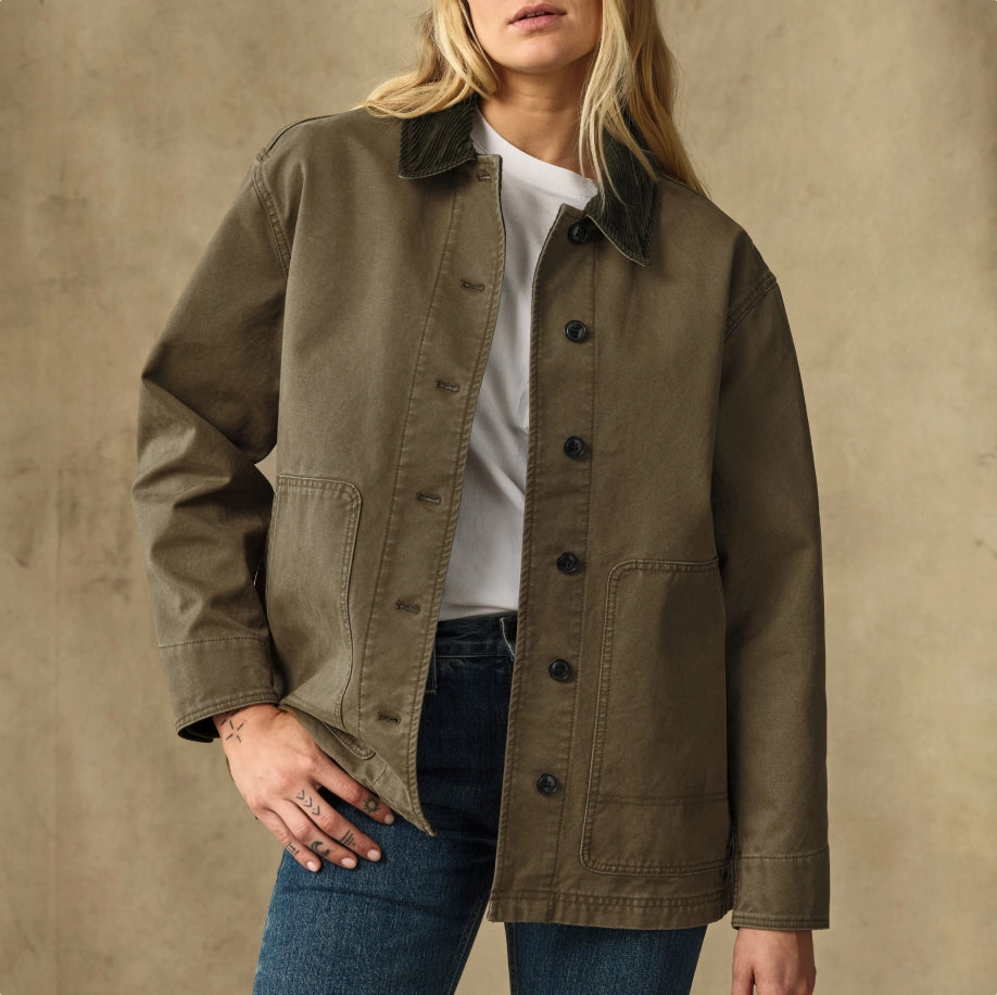 Woman in an olive canvas jacket