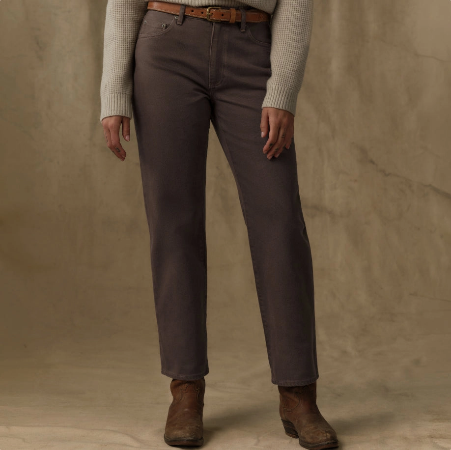 Woman in brown pants and boots