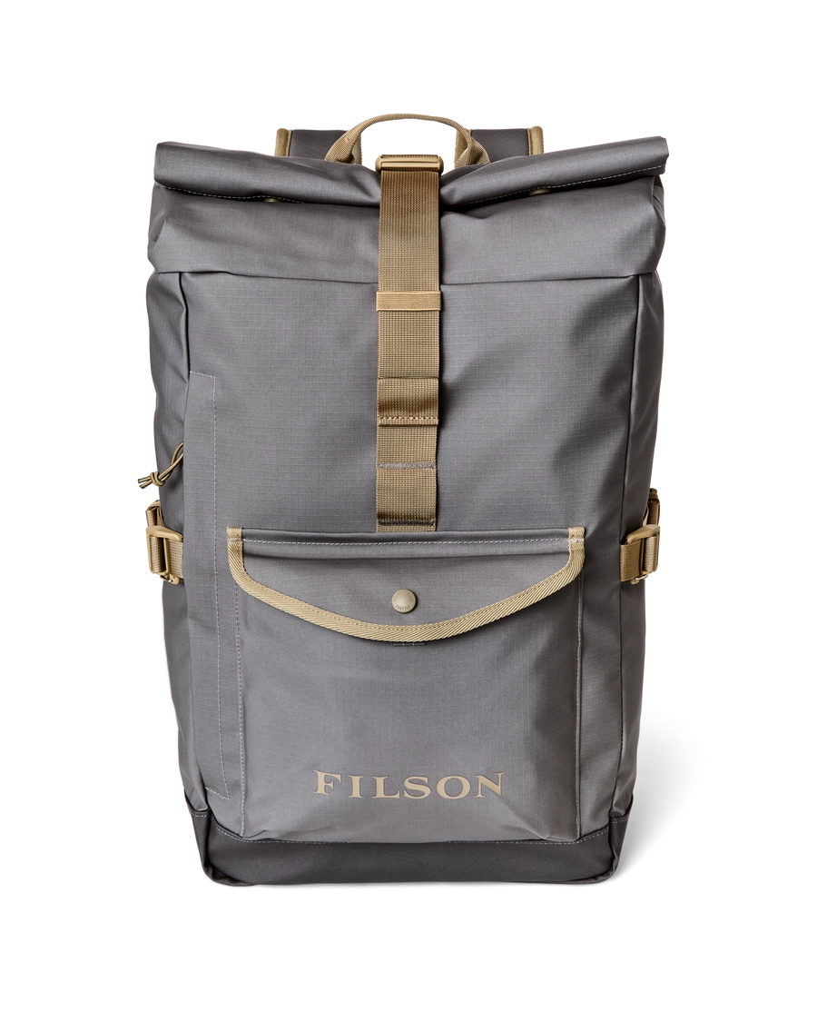 Grey roll-top backpack with tan straps